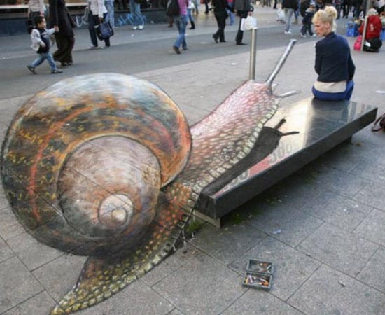 O artista Julian Beever pintou um caracol gigante em plena Times Square!