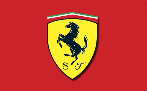 FERRARI - O cavalo negro empinado era o símbolo de Francesco Baracca, um lendário piloto italiano e herói nacional. No fundo amarelo, aparecem ainda as letras S e F, de Scuderia Ferrari.