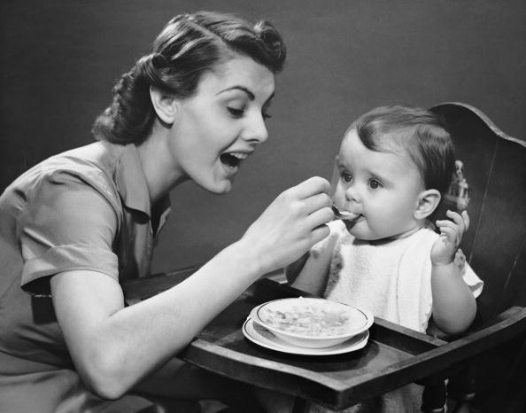 Mother feeding baby