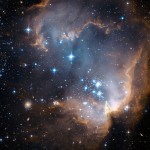Novas estrelas (em azul brilhante) no berçário estelar N90.