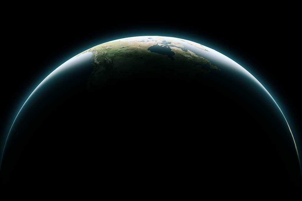 Foto da silhueta da Terra no espaço sideral.