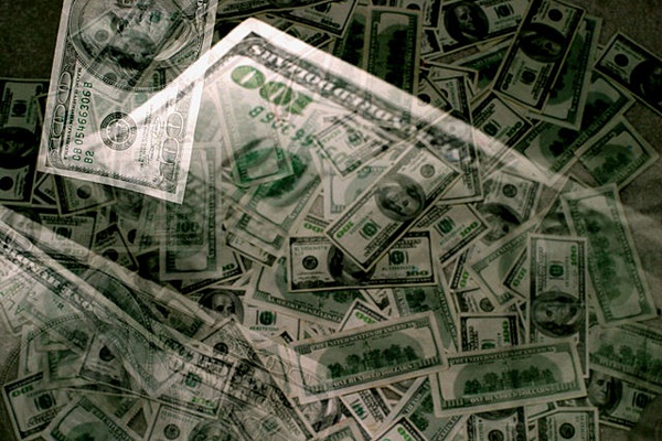 Por que a moeda americana se chama dólar?