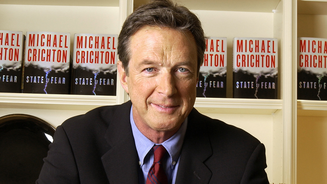 Author Michael Crichton poses at The Peninsula Hotel in New York, Dec. 7, 2004. In Crichton's new book, "State of Fear," he questions global warming in the thriller about eco-terrorists who plot a series of natural disasters _ earthquakes, underwater landslides, a tsunami _ to prove that global warming is a threat to humanity. (AP Photo/Jim Cooper)