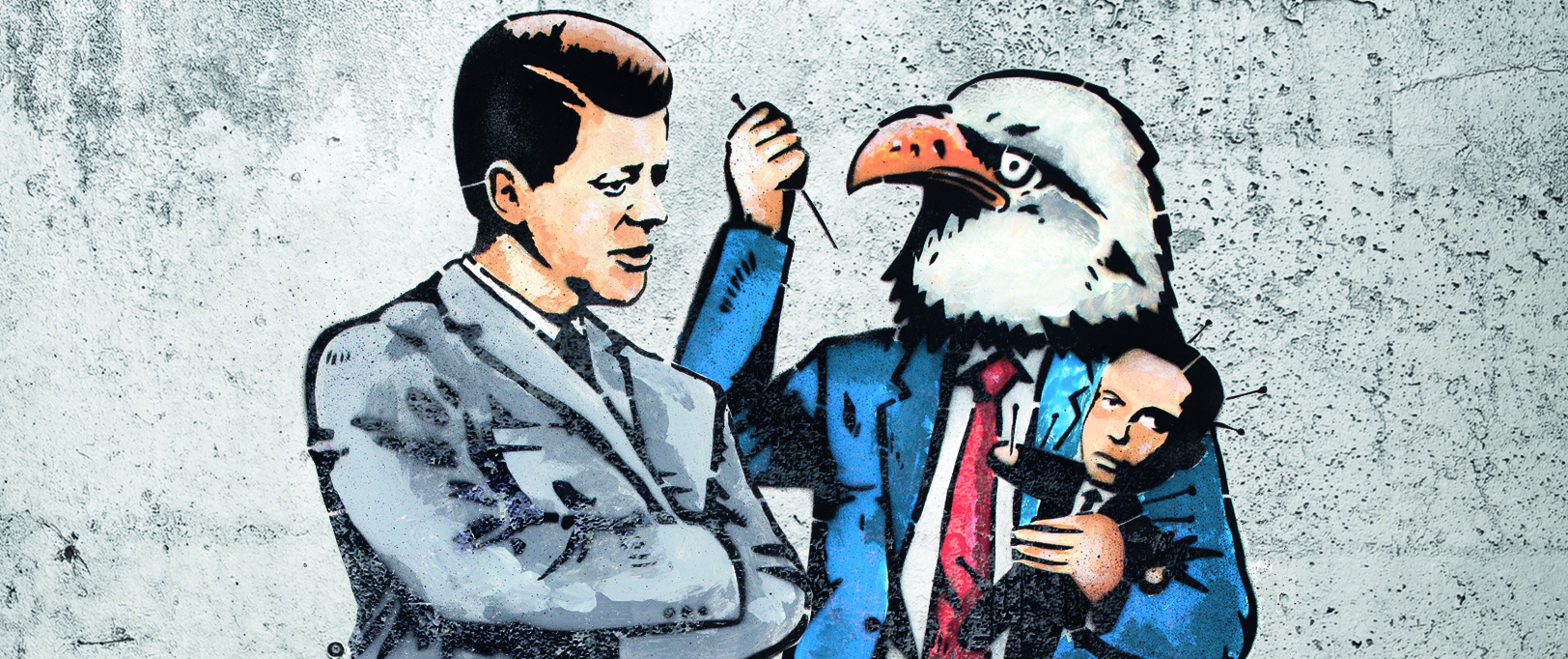 Ilustração em forma de grafite: John Kennedy, com terno cinza, ao lado de um homem-água de terno azul. Ele está segurando m boneco vodu, todo espeto, do presidente Jango