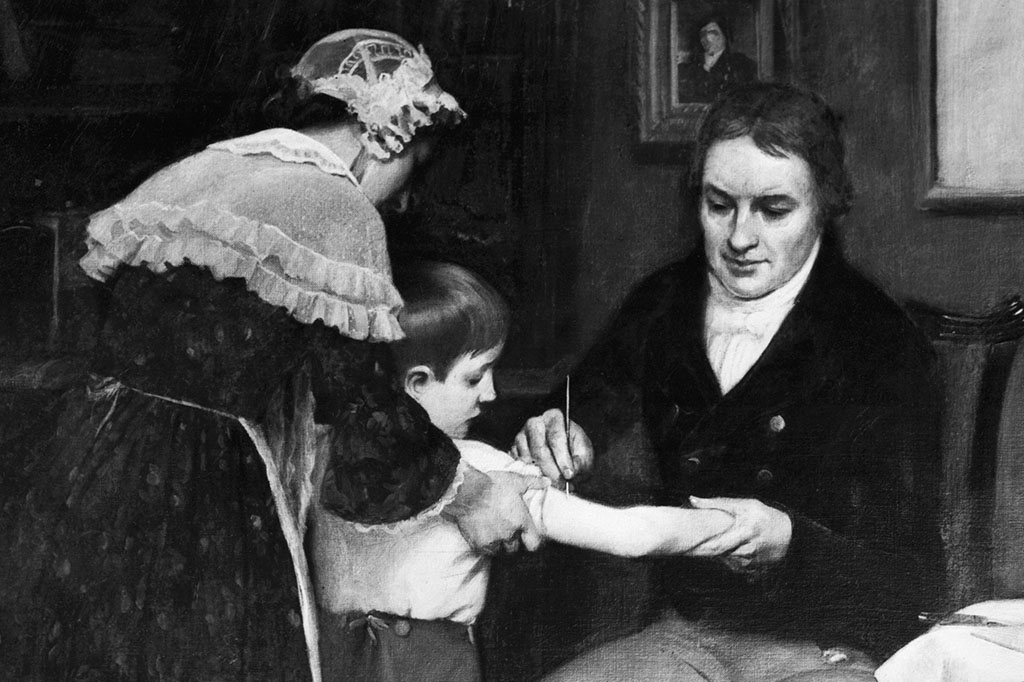 Dr. Edward Jenner aplicando a vacina no braço de um menininho (1796).