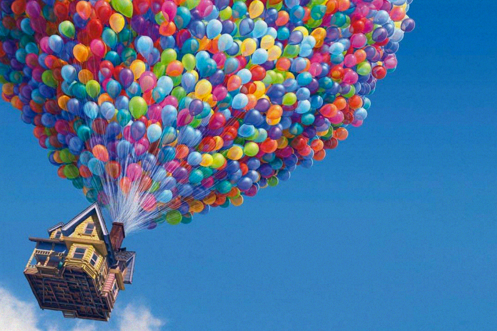 Casa flutuando com ajuda de balões em cena do filme 'Up - Altas aventuras'.