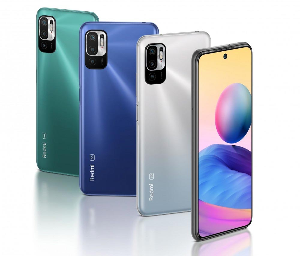 4 smartphones Redmi Note 10 5G nas cores verde, azul e prata num fundo branco.