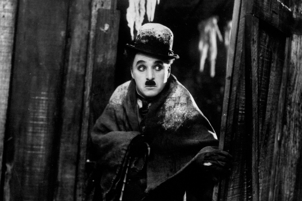 Imagem de Charlie Chaplin em cena de um de seus filmes, "Gold Rush".