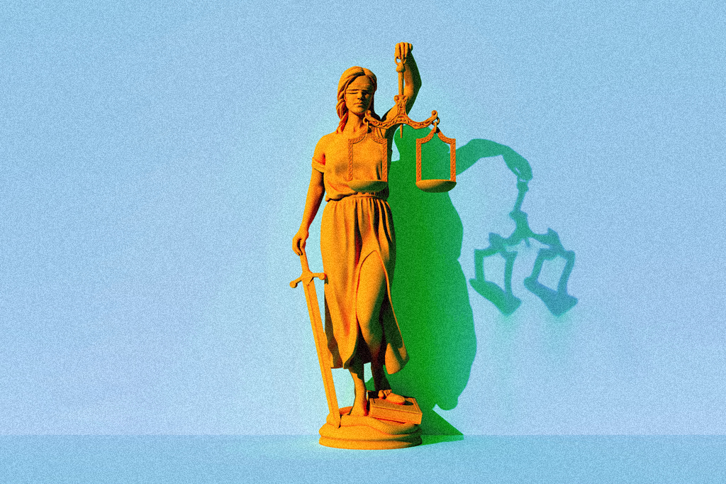 Imagem da estátua da Justiça com sombra distorcida.