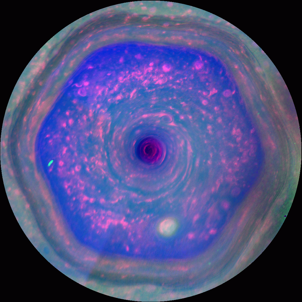 Gif colorido que mostra a visão completa do polo norte de Saturno, onde consegue-se ver o hexágono e suas variações de movimento.