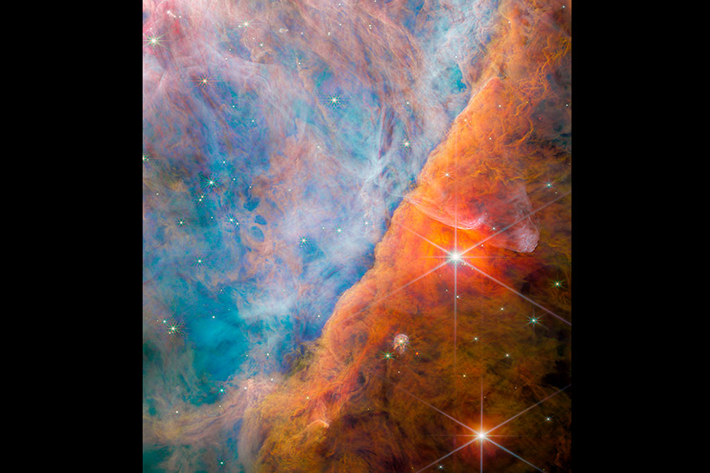 Imagem tirada pela NIRCam (Câmera de infravermelho próximo) de Webb mostra uma parte da Nebulosa de Orion conhecida como Barra de Orion