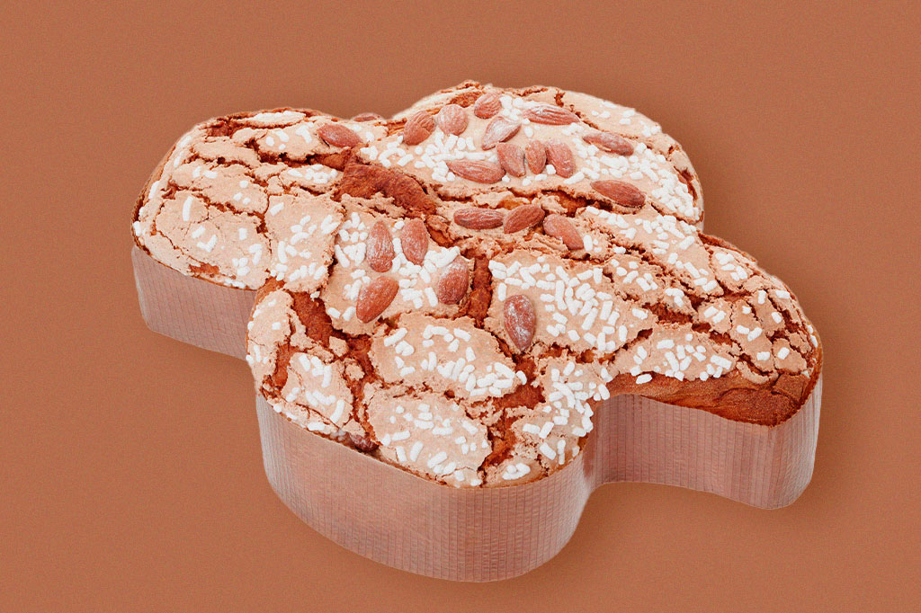 SI_454_Oraculo-Conexoes1_site Foto de colomba, italiano Bolo de Páscoa, sob fundo marrom.