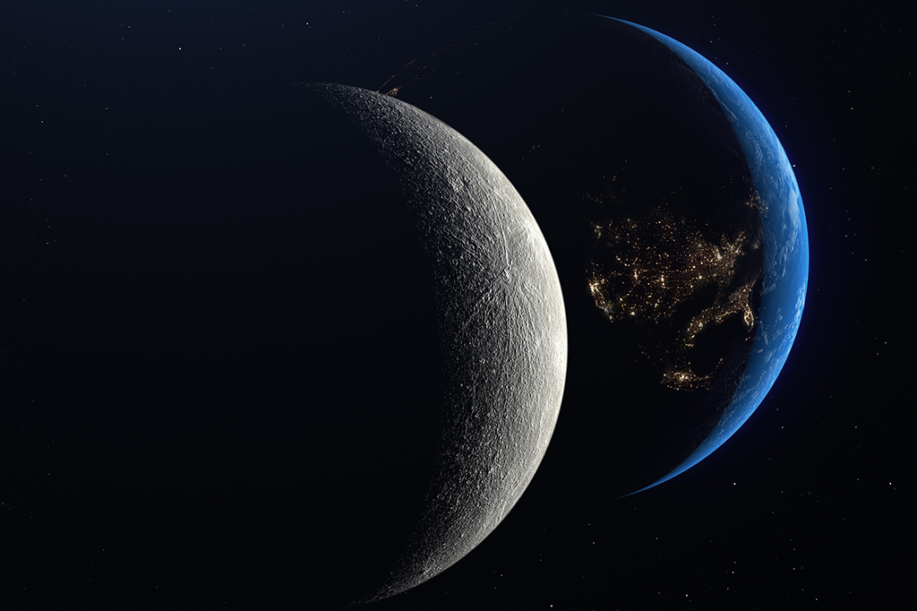 Imagem com silhuetas da Lua e da Terra no espaço.