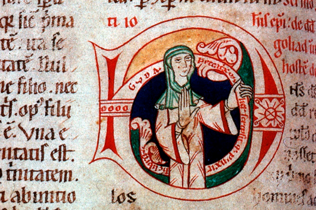Fotografia do manuscrito do século XII que inclui um autorretrato de uma escriba chamada Guda.