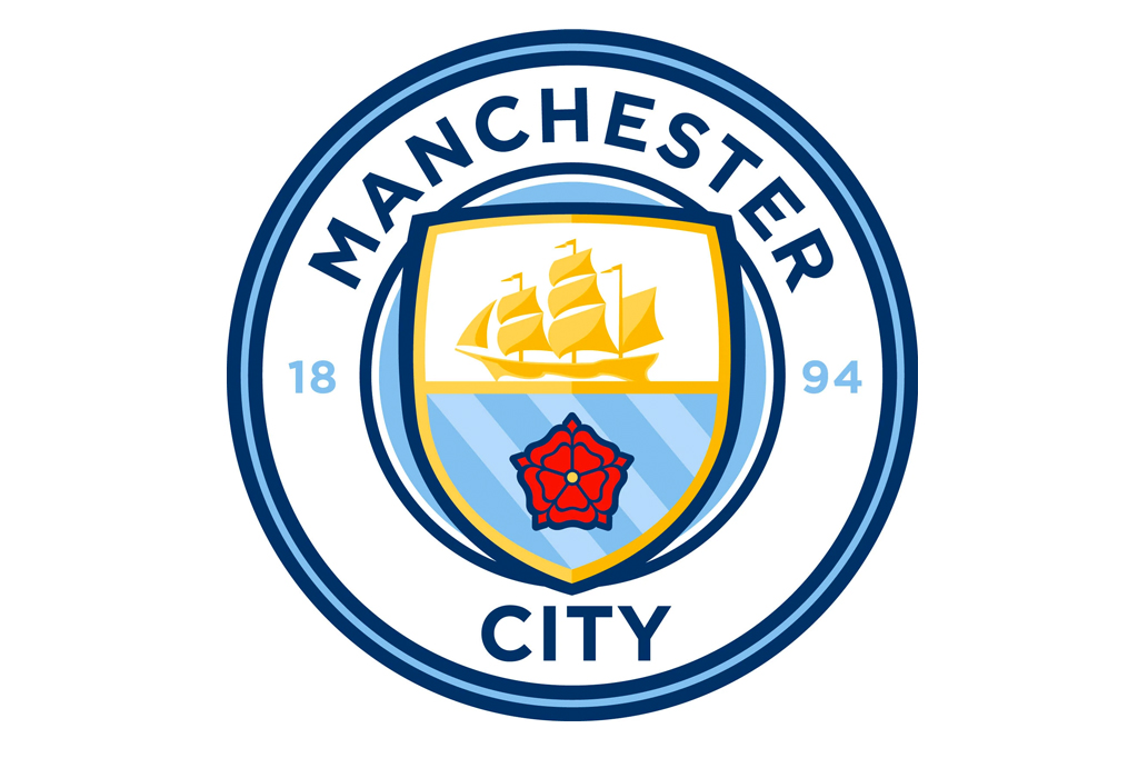 SI_476_Oráculo_Conexões_4_ Imagem com o escudo do time de futebol Manchester City.