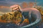 Esta imagem mostra uma ilustração artística do recém-descoberto dinossauro Joaquinraptor casali com a pata dianteira de um antigo parente do crocodilo na boca.