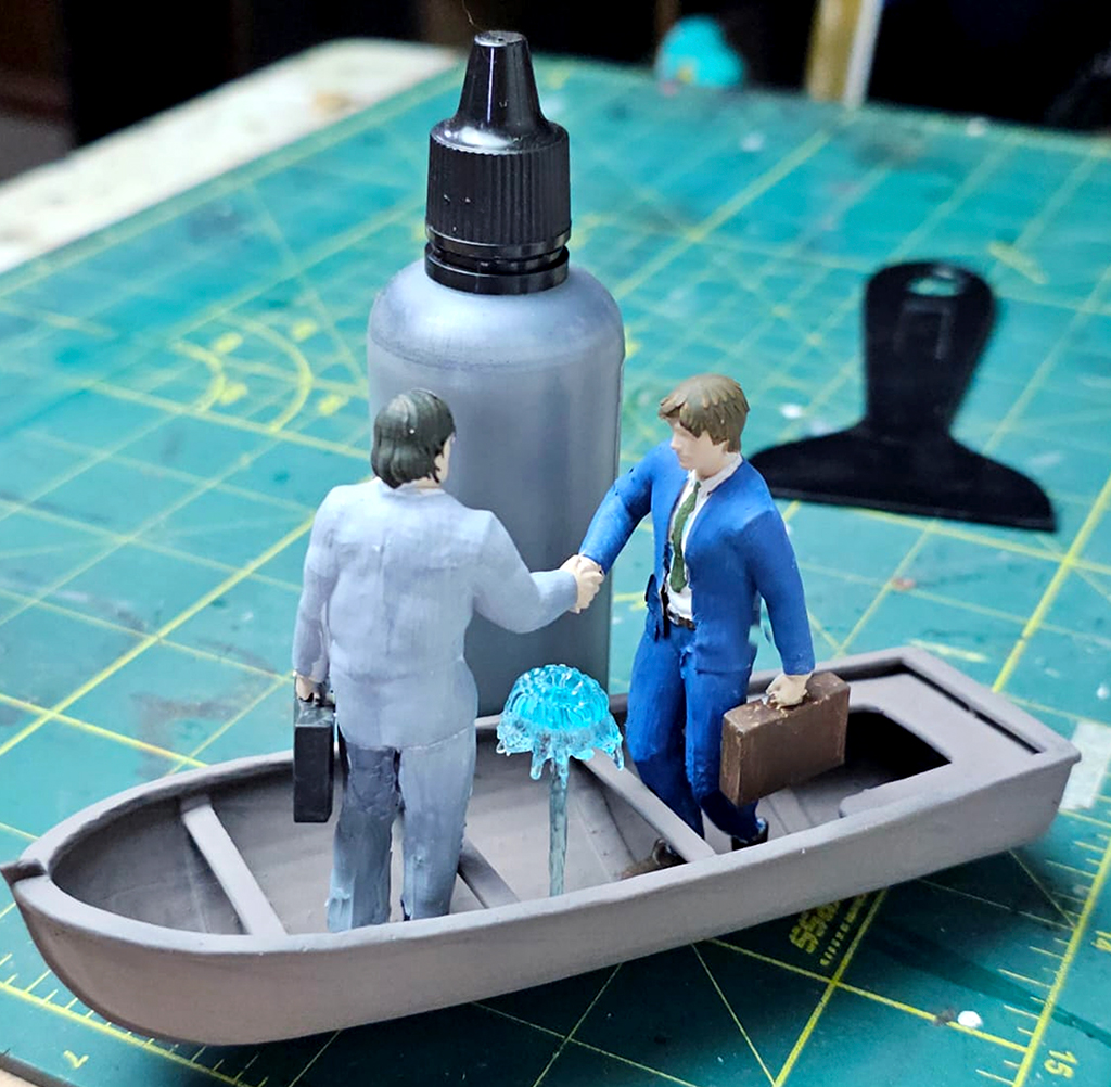 Imagem do processo de pintura da miniatura.