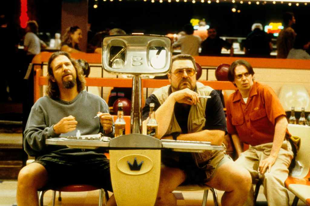 Fotografia de Steve Buscemi, Jeff Bridges e John Goodman em O Grande Lebowski (1998).