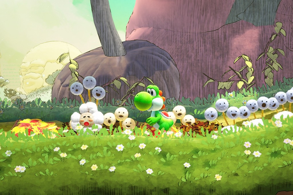 Yoshi verde caminhando por um campo florido com criaturas fofas e redondas, algumas brancas e outras azuis, com rostos sorridentes ou surpresos. Ao fundo, uma paisagem de montanhas e um sol amarelo.