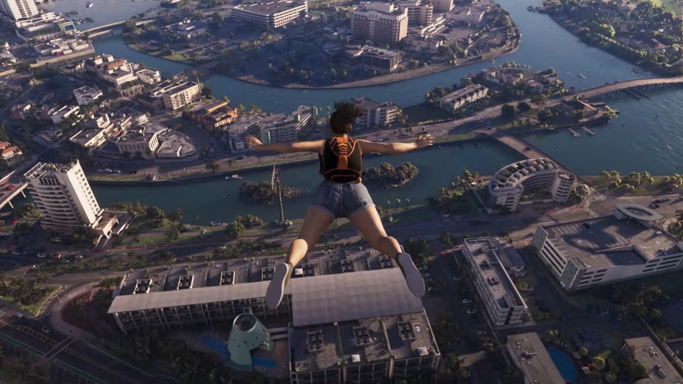Vis&atilde;o a&eacute;rea de uma pessoa de costas, com mochila laranja e preta, shorts jeans e t&ecirc;nis cinza, caindo de bra&ccedil;os abertos sobre uma cidade com rio sinuoso, pr&eacute;dios e pontes