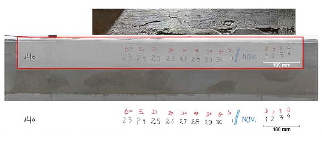Uma superf&iacute;cie cinza clara com anota&ccedil;&otilde;es manuscritas em vermelho e preto, incluindo 14o, dias da semana e datas de 23 a 30 de outubro e 1 a 4 de novembro, com uma r&eacute;gua de 100 mm
